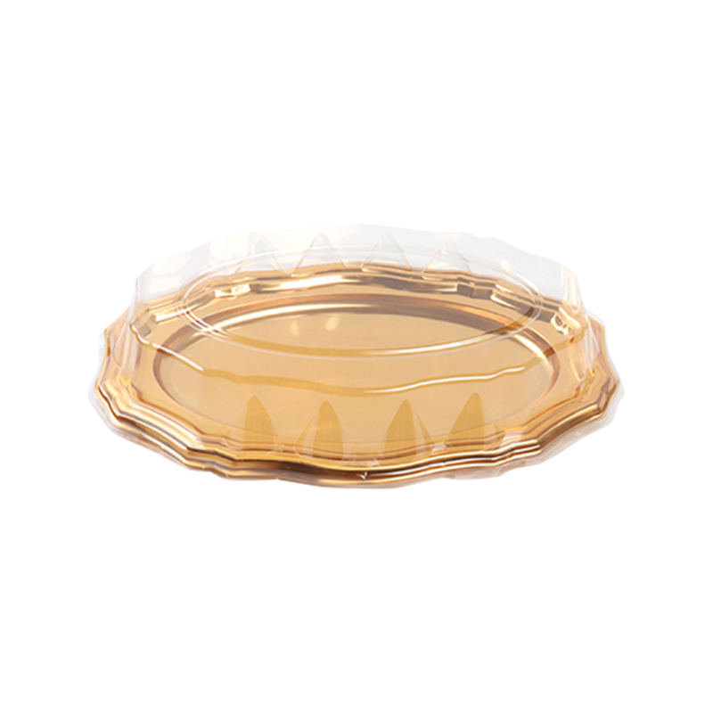 Gylden plastik kagebakke